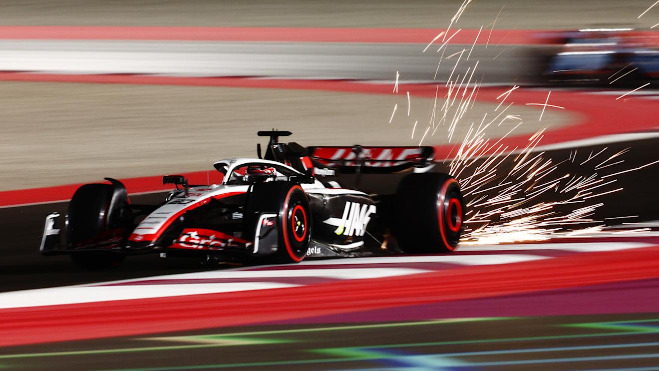 LUSAIL CITY, QATAR - OCTOBER 06: Sparks fly behind Kevin Magnussen of Denmark driving the (20) Haas F1 VF-23 Ferrari during qualifying ahead of the F1 Grand Prix of Qatar at Lusail International Circuit on October 06, 2023 in Lusail City, Qatar. (Photo by Clive Rose/Getty Images)