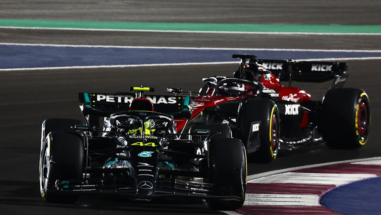 LUSAIL CITY, QATAR - OCTOBER 07: Lewis Hamilton of Great Britain driving the (44) Mercedes AMG Petronas F1 Team W14 leads Valtteri Bottas of Finland driving the (77) Alfa Romeo F1 C43 Ferrari during the Sprint ahead of the F1 Grand Prix of Qatar at Lusail International Circuit on October 07, 2023 in Lusail City, Qatar. (Photo by Clive Rose/Getty Images)