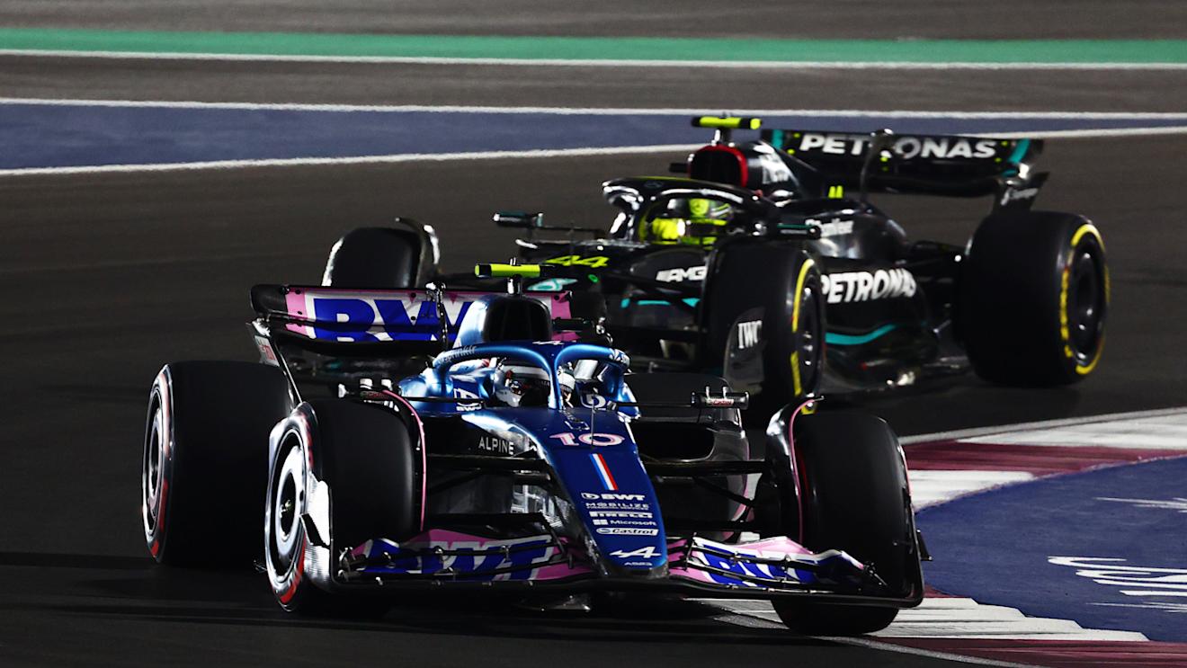 LUSAIL CITY, QATAR - OCTOBER 07: Pierre Gasly of France driving the (10) Alpine F1 A523 Renault leads Lewis Hamilton of Great Britain driving the (44) Mercedes AMG Petronas F1 Team W14 during the Sprint ahead of the F1 Grand Prix of Qatar at Lusail International Circuit on October 07, 2023 in Lusail City, Qatar. (Photo by Clive Rose/Getty Images)
