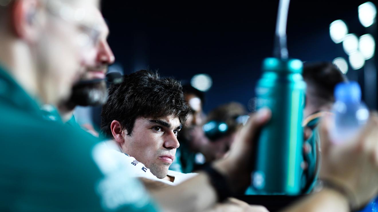 LUSAIL CITY, QATAR - OCTOBER 07: Lance Stroll of Canada and Aston Martin F1 Team prepares to drive on the grid  during the Sprint ahead of the F1 Grand Prix of Qatar at Lusail International Circuit on October 07, 2023 in Lusail City, Qatar. (Photo by Rudy Carezzevoli/Getty Images)