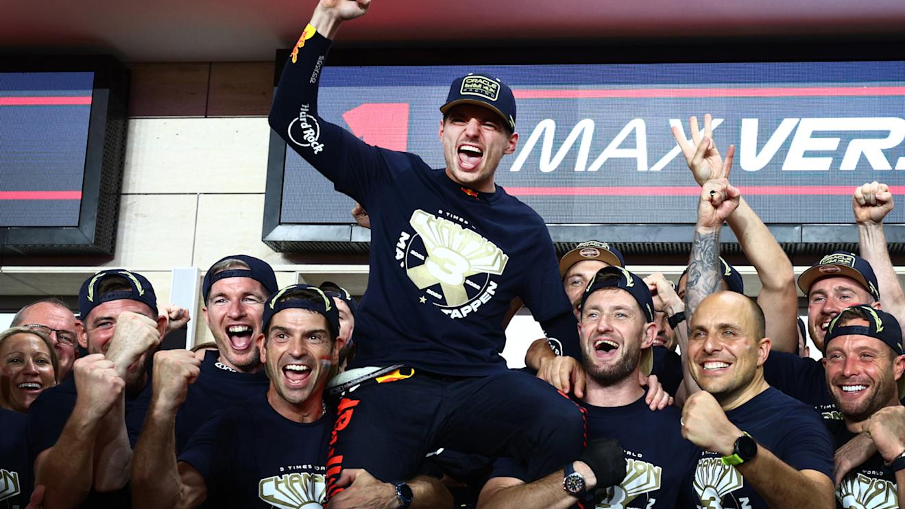 LUSAIL CITY, QATAR - OCTOBER 07: 2023 F1 World Drivers Champion Max Verstappen of the Netherlands and Oracle Red Bull Racing celebrates with his team in the Pitlane after the Sprint ahead of the F1 Grand Prix of Qatar at Lusail International Circuit on October 07, 2023 in Lusail City, Qatar. (Photo by Clive Rose/Getty Images)