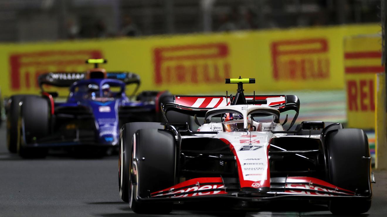 JEDDAH, SAUDI ARABIA - MARCH 19: Nico Hulkenberg of Germany driving the (27) Haas F1 VF-23 Ferrari leads Logan Sargeant of United States driving the (2) Williams FW45 Mercedes during the F1 Grand Prix of Saudi Arabia at Jeddah Corniche Circuit on March 19, 2023 in Jeddah, Saudi Arabia. (Photo by Peter Fox/Getty Images)