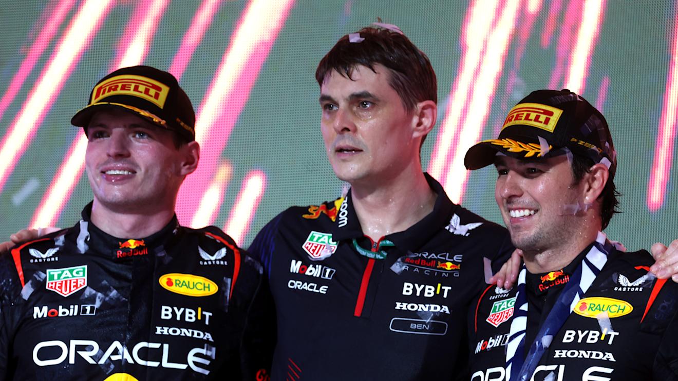 JEDDAH, SAUDI ARABIA - MARCH 19: Race winner Sergio Perez of Mexico and Oracle Red Bull Racing (R), Second placed Max Verstappen of the Netherlands and Oracle Red Bull Racing (L) and Ben Waterhouse, Head of Performance Engineering at Red Bull Racing, celebrate on the podium during the F1 Grand Prix of Saudi Arabia at Jeddah Corniche Circuit on March 19, 2023 in Jeddah, Saudi Arabia. (Photo by Lars Baron/Getty Images)