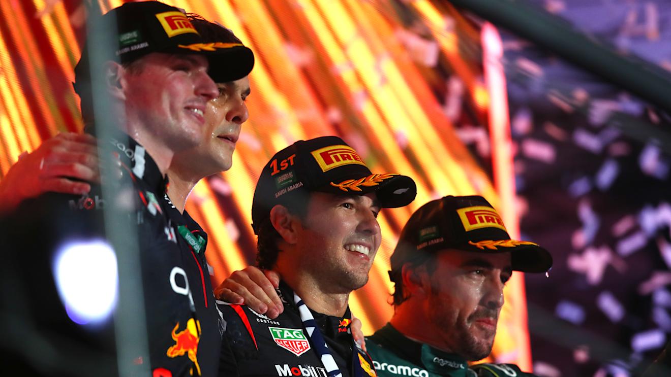 JEDDAH, SAUDI ARABIA - MARCH 19: Race winner Sergio Perez of Mexico and Oracle Red Bull Racing celebrates on the podium during the F1 Grand Prix of Saudi Arabia at Jeddah Corniche Circuit on March 19, 2023 in Jeddah, Saudi Arabia. (Photo by Joe Portlock - Formula 1/Formula 1 via Getty Images)