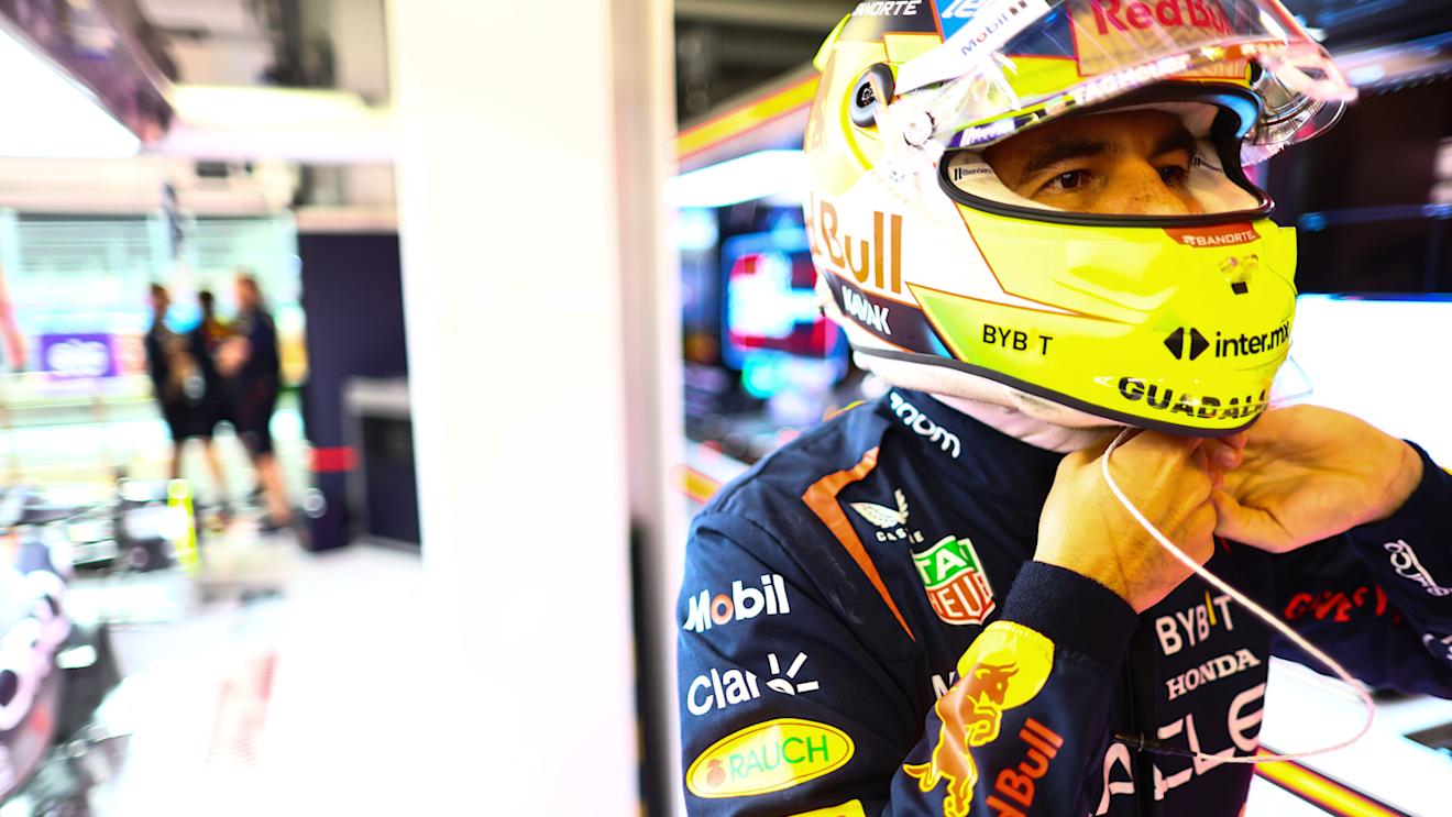 JEDDAH, SAUDI ARABIA - MARCH 18: Sergio Perez of Mexico and Oracle Red Bull Racing prepares to drive in the garage during qualifying ahead of the F1 Grand Prix of Saudi Arabia at Jeddah Corniche Circuit on March 18, 2023 in Jeddah, Saudi Arabia. (Photo by Mark Thompson/Getty Images)