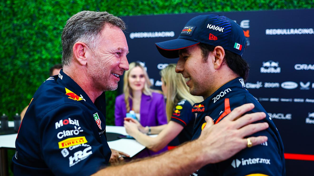 JEDDAH, SAUDI ARABIA - MARCH 18: Red Bull Racing Team Principal Christian Horner talks with Pole position qualifier Sergio Perez of Mexico and Oracle Red Bull Racing in the Paddock after qualifying ahead of the F1 Grand Prix of Saudi Arabia at Jeddah Corniche Circuit on March 18, 2023 in Jeddah, Saudi Arabia. (Photo by Mark Thompson/Getty Images)