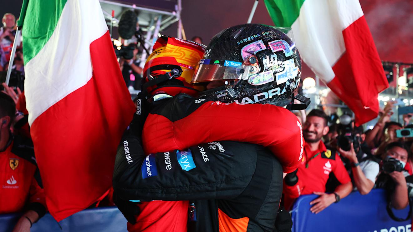 SINGAPORE, SINGAPORE - SEPTEMBER 17: Race winner Carlos Sainz of Spain and Ferrari and Second placed Lando Norris of Great Britain and McLaren celebrate in parc ferme during the F1 Grand Prix of Singapore at Marina Bay Street Circuit on September 17, 2023 in Singapore, Singapore. (Photo by Dan Istitene - Formula 1/Formula 1 via Getty Images)