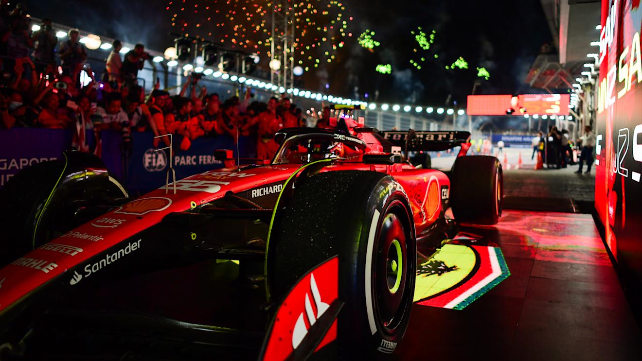 SINGAPORE, SINGAPORE - SEPTEMBER 17: Race winner Carlos Sainz of Spain and Ferrari arrives in parc ferme during the F1 Grand Prix of Singapore at Marina Bay Street Circuit on September 17, 2023 in Singapore, Singapore. (Photo by Mario Renzi - Formula 1/Formula 1 via Getty Images)
