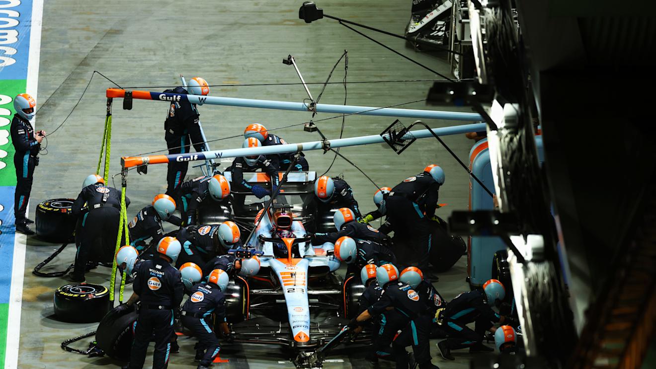 SINGAPORE, SINGAPORE - SEPTEMBER 17: Alexander Albon of Thailand driving the (23) Williams FW45 Mercedes makes a pitstop during the F1 Grand Prix of Singapore at Marina Bay Street Circuit on September 17, 2023 in Singapore, Singapore. (Photo by Bryn Lennon - Formula 1/Formula 1 via Getty Images)
