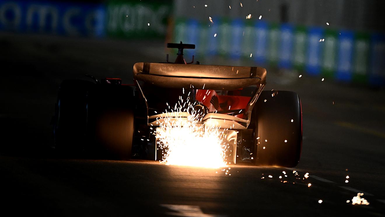 SINGAPORE, SINGAPORE - SEPTEMBER 16: Sparks fly behind Charles Leclerc of Monaco driving the (16) Ferrari SF-23 during qualifying ahead of the F1 Grand Prix of Singapore at Marina Bay Street Circuit on September 16, 2023 in Singapore, Singapore. (Photo by Clive Mason/Getty Images)