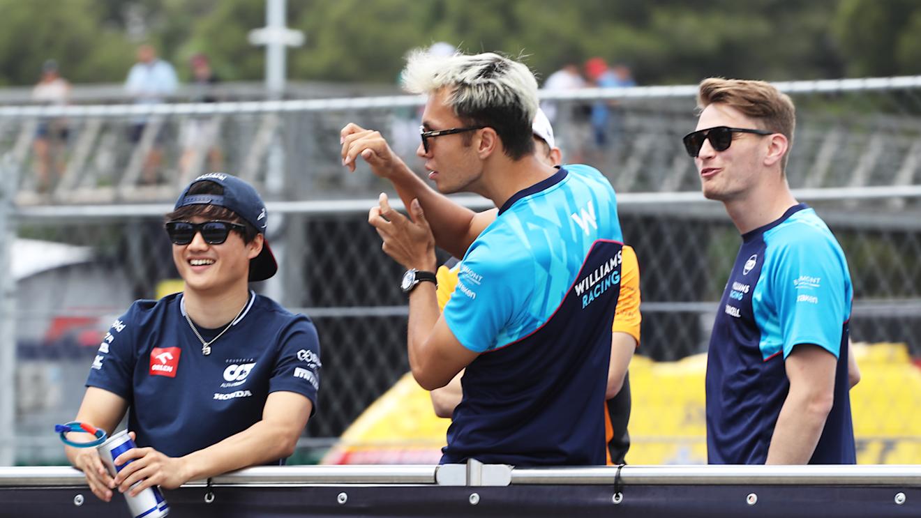 BARCELONA, SPAIN - JUNE 04: Yuki Tsunoda of Japan and Scuderia AlphaTauri, Alexander Albon of Thailand and Williams and Logan Sargeant of United States and Williams look on from the drivers parade prior to the F1 Grand Prix of Spain at Circuit de Barcelona-Catalunya on June 04, 2023 in Barcelona, Spain. (Photo by Peter Fox/Getty Images)