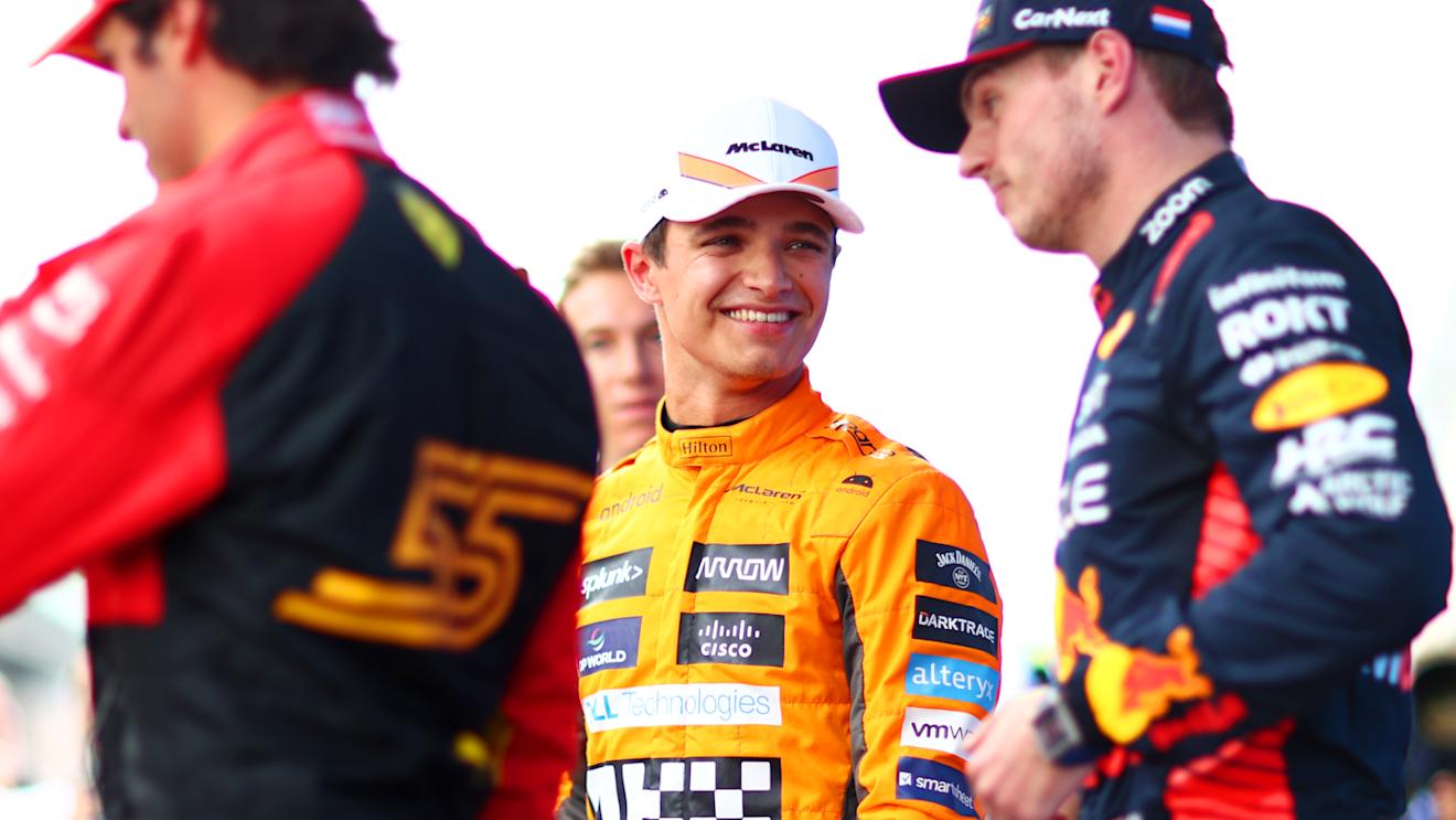 BARCELONA, SPAIN - JUNE 03: Third placed qualifier Lando Norris of Great Britain and McLaren smiles as he speaks with Pole position qualifier Max Verstappen of the Netherlands and Oracle Red Bull Racing and Second placed qualifier Carlos Sainz of Spain and Ferrari in parc ferme during qualifying ahead of the F1 Grand Prix of Spain at Circuit de Barcelona-Catalunya on June 03, 2023 in Barcelona, Spain. (Photo by Dan Istitene - Formula 1/Formula 1 via Getty Images)