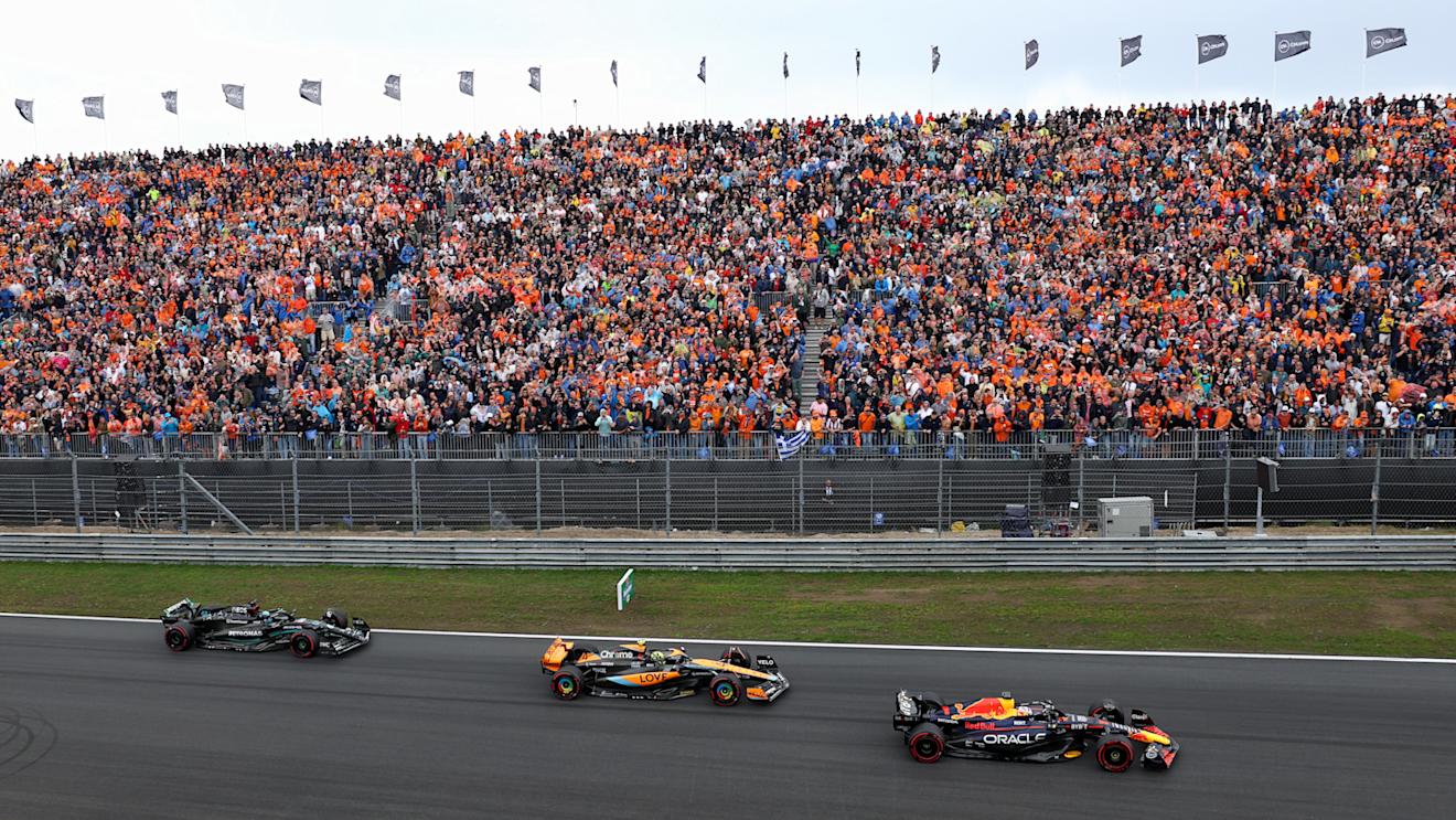 ZANDVOORT, NETHERLANDS - AUGUST 27: Max Verstappen of the Netherlands driving the (1) Oracle Red Bull Racing RB19 leads Lando Norris of Great Britain driving the (4) McLaren MCL60 Mercedes and George Russell of Great Britain driving the (63) Mercedes AMG Petronas F1 Team W14 into turn one at the start during the F1 Grand Prix of The Netherlands at Circuit Zandvoort on August 27, 2023 in Zandvoort, Netherlands. (Photo by Dan Istitene - Formula 1/Formula 1 via Getty Images)