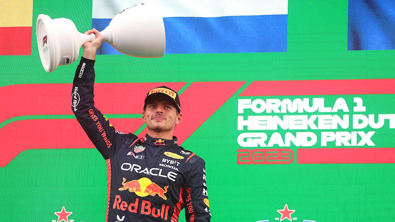 ZANDVOORT, NETHERLANDS - AUGUST 27: Race winner Max Verstappen of the Netherlands and Oracle Red Bull Racing celebrates on the podium during the F1 Grand Prix of The Netherlands at Circuit Zandvoort on August 27, 2023 in Zandvoort, Netherlands. (Photo by Peter Fox/Getty Images)