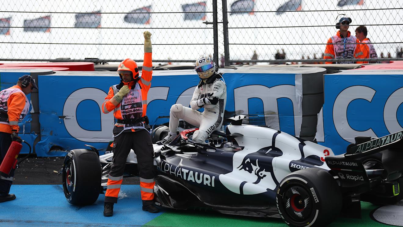ZANDVOORT, NETHERLANDS - AUGUST 25: Daniel Ricciardo of Australia and Scuderia AlphaTauri walks from his car after crashing during practice ahead of the F1 Grand Prix of The Netherlands at Circuit Zandvoort on August 25, 2023 in Zandvoort, Netherlands. (Photo by Lars Baron/Getty Images)