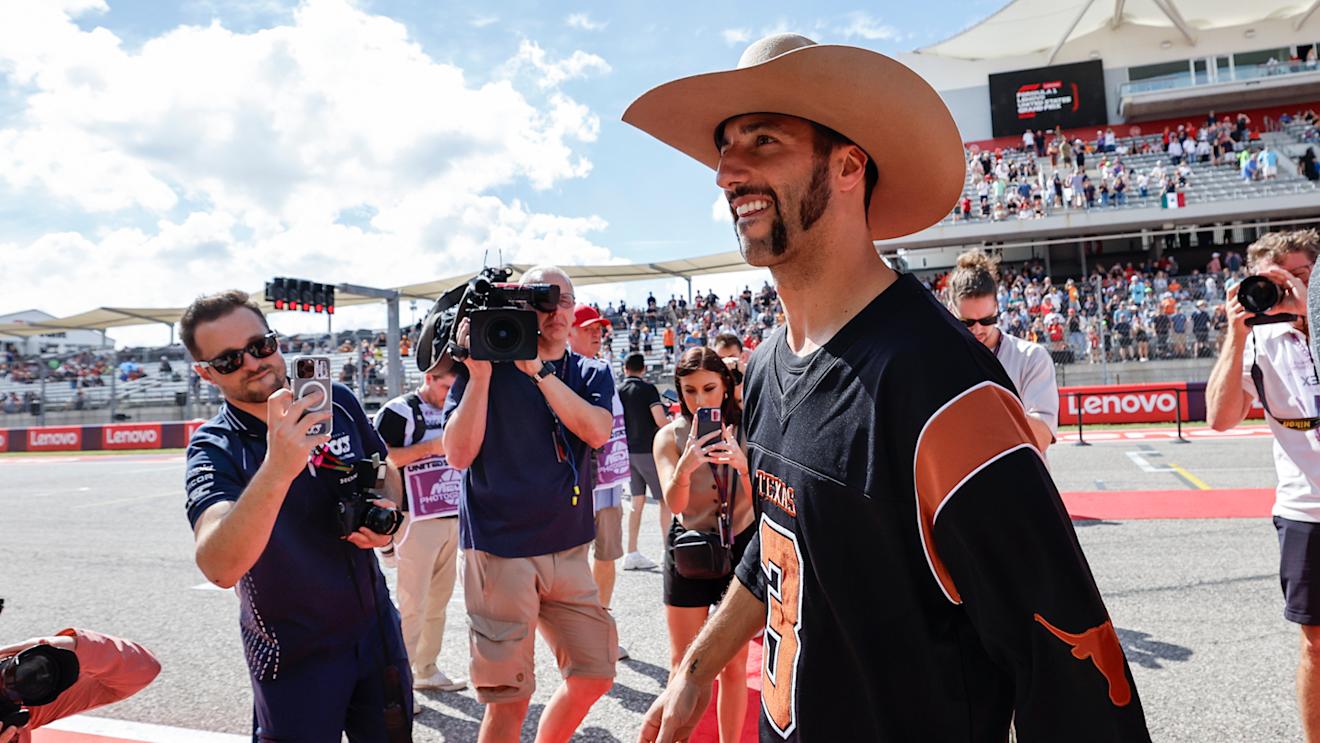 AUSTIN, TEXAS - OCTOBER 22: Daniel Ricciardo of Australia and Scuderia AlphaTauri looks on from the drivers parade prior to the F1 Grand Prix of United States at Circuit of The Americas on October 22, 2023 in Austin, Texas. (Photo by Chris Graythen/Getty Images)