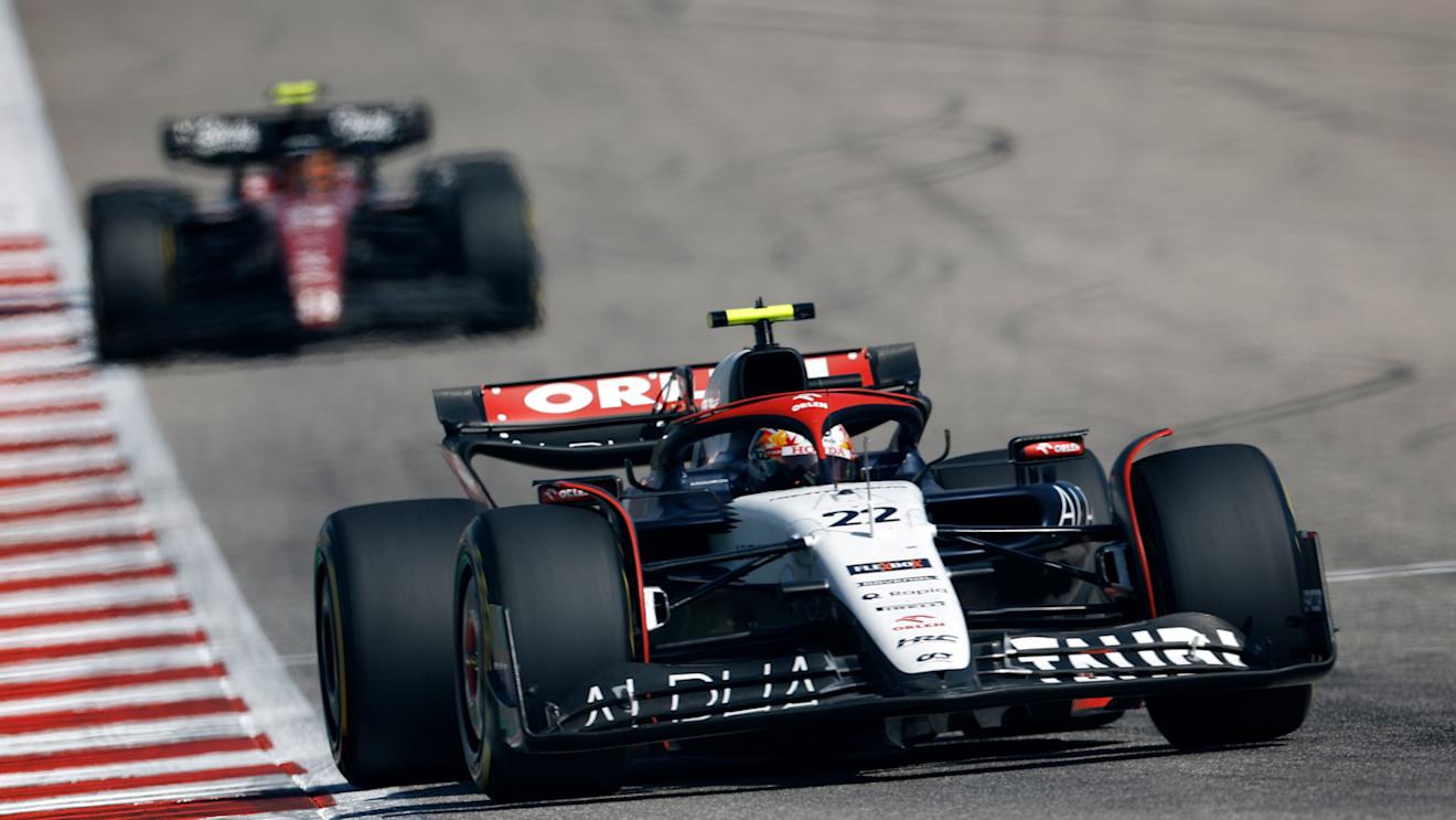 AUSTIN, TEXAS - OCTOBER 22: Yuki Tsunoda of Japan driving the (22) Scuderia AlphaTauri AT04 leads Zhou Guanyu of China driving the (24) Alfa Romeo F1 C43 Ferrari on track during the F1 Grand Prix of United States at Circuit of The Americas on October 22, 2023 in Austin, Texas. (Photo by Chris Graythen/Getty Images)