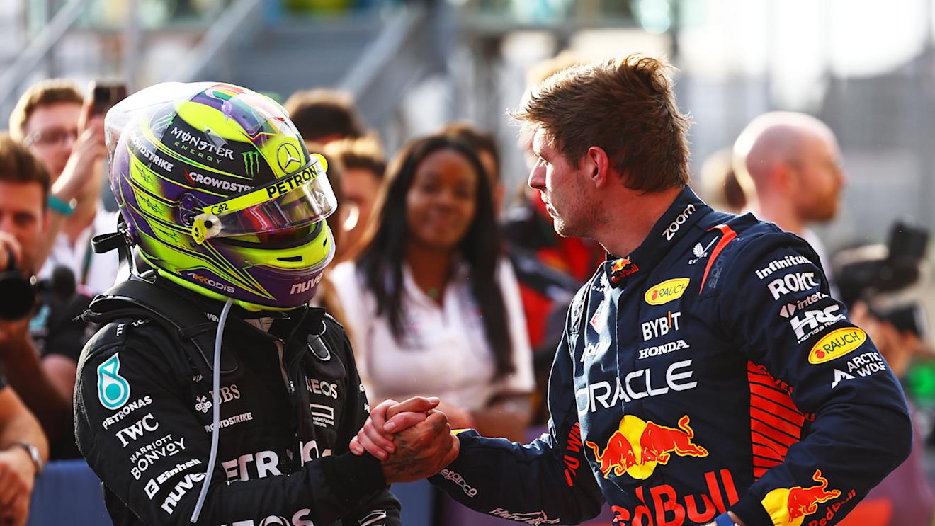 AUSTIN, TEXAS - OCTOBER 21: Sprint winner Max Verstappen of the Netherlands and Oracle Red Bull Racing shakes hands with Second placed Lewis Hamilton of Great Britain and Mercedes in parc ferme after the Sprint ahead of the F1 Grand Prix of United States at Circuit of The Americas on October 21, 2023 in Austin, Texas. (Photo by Mark Thompson/Getty Images)