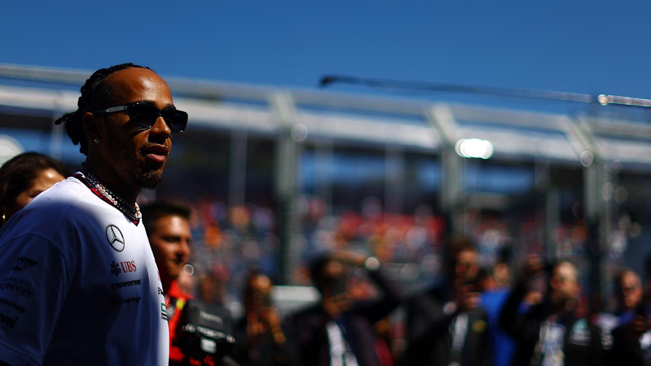 MELBOURNE, AUSTRALIA - MARCH 24: Lewis Hamilton of Great Britain and Mercedes looks on from the drivers parade prior to the F1 Grand Prix of Australia at Albert Park Circuit on March 24, 2024 in Melbourne, Australia. (Photo by Mark Thompson/Getty Images)