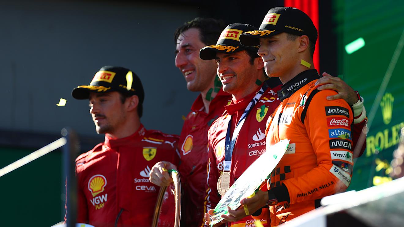 MELBOURNE, AUSTRALIA - MARCH 24: Race winner Carlos Sainz of Spain and Ferrari, Second placed Charles Leclerc of Monaco and Ferrari and Third placed Lando Norris of Great Britain and McLaren celebrate on the podium duringthe F1 Grand Prix of Australia at Albert Park Circuit on March 24, 2024 in Melbourne, Australia. (Photo by Peter Fox/Getty Images)
