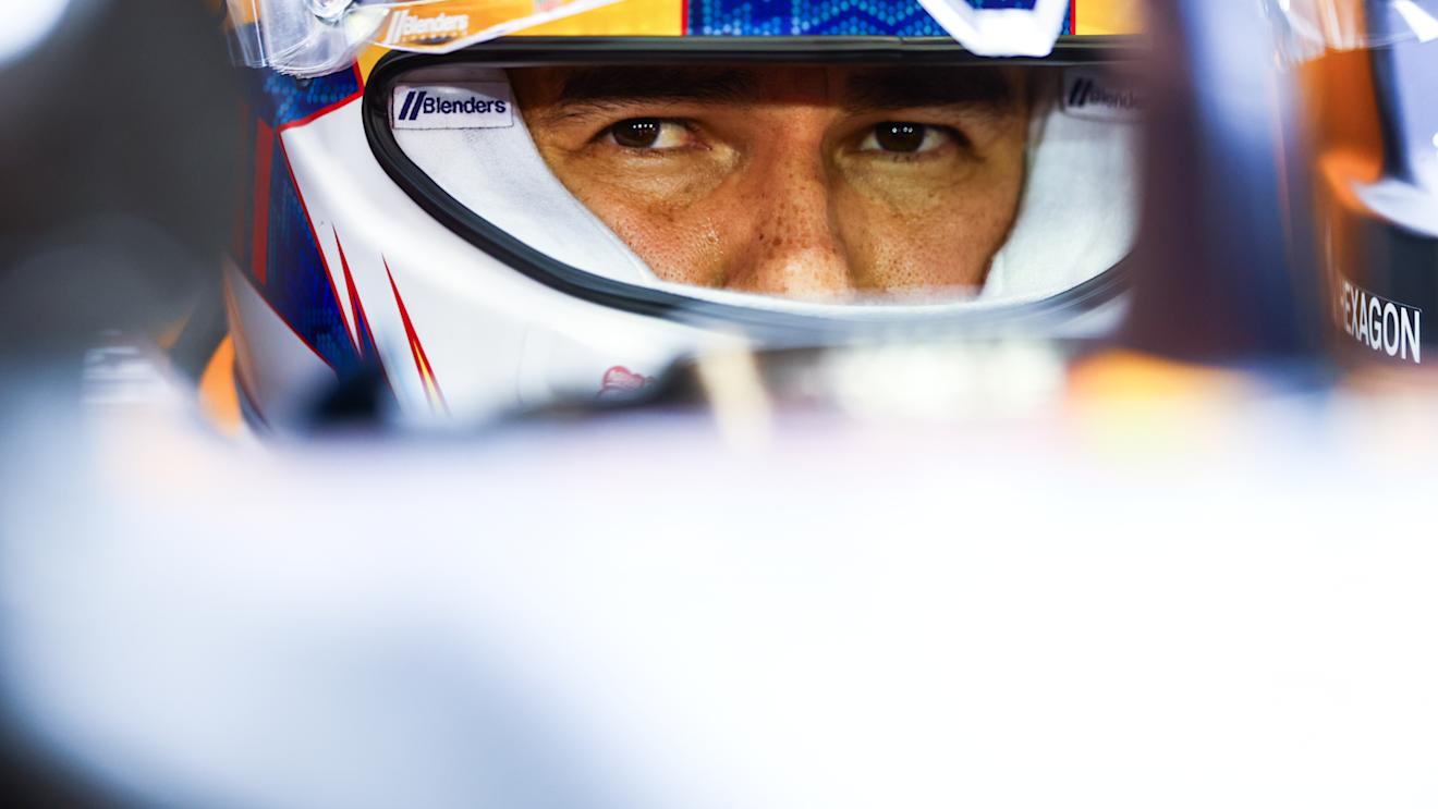 BAHRAIN, BAHRAIN - MARCH 01: Sergio Perez of Mexico and Oracle Red Bull Racing prepares to drive in the garage during qualifying ahead of the F1 Grand Prix of Bahrain at Bahrain International Circuit on March 01, 2024 in Bahrain, Bahrain. (Photo by Mark Thompson/Getty Images)