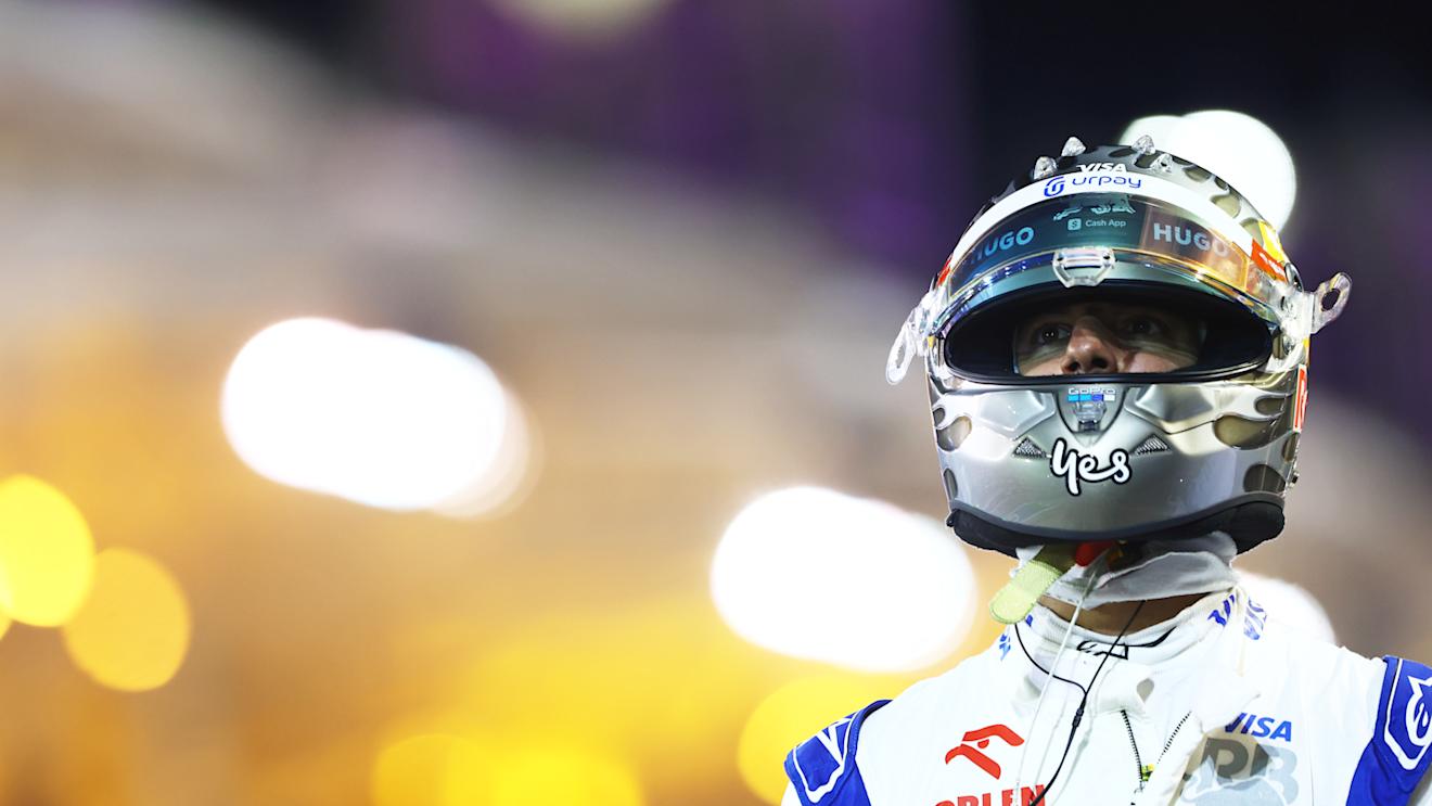 BAHRAIN, BAHRAIN - MARCH 01: 13th placed qualifier Daniel Ricciardo of Australia and Visa Cash App RB walks in the Pitlane during qualifying ahead of the F1 Grand Prix of Bahrain at Bahrain International Circuit on March 01, 2024 in Bahrain, Bahrain. (Photo by Mark Thompson/Getty Images)
