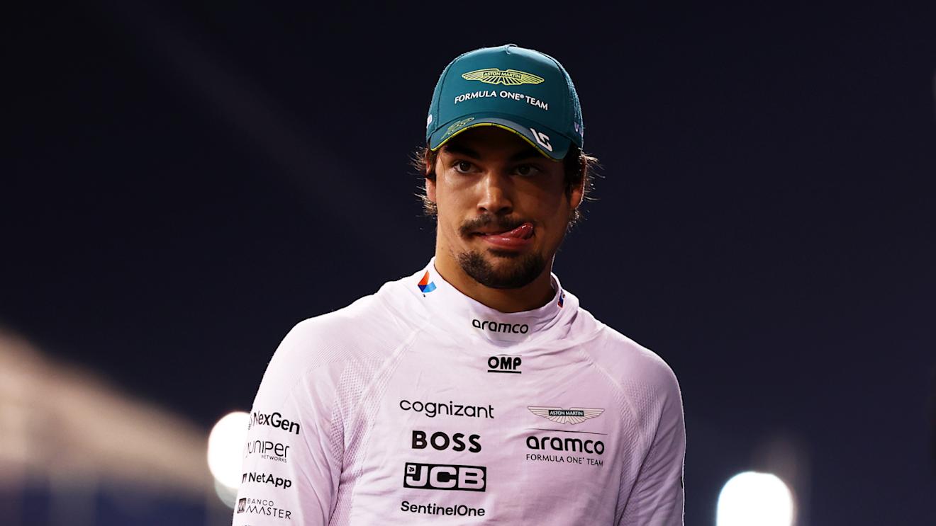 BAHRAIN, BAHRAIN - MARCH 01: 12th placed qualifier Lance Stroll of Canada and Aston Martin F1 Team walks in the Pitlane during qualifying ahead of the F1 Grand Prix of Bahrain at Bahrain International Circuit on March 01, 2024 in Bahrain, Bahrain. (Photo by Bryn Lennon - Formula 1/Formula 1 via Getty Images)
