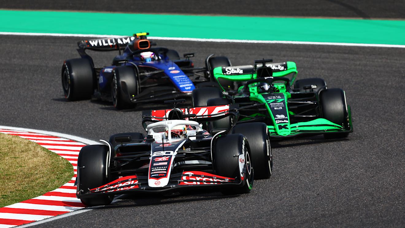 SUZUKA, JAPAN - APRIL 07: Kevin Magnussen of Denmark driving the (20) Haas F1 VF-24 Ferrari leads Valtteri Bottas of Finland driving the (77) Kick Sauber C44 Ferrari and Logan Sargeant of United States driving the (2) Williams FW46 Mercedes during the F1 Grand Prix of Japan at Suzuka International Racing Course on April 07, 2024 in Suzuka, Japan. (Photo by Clive Rose - Formula 1/Formula 1 via Getty Images)