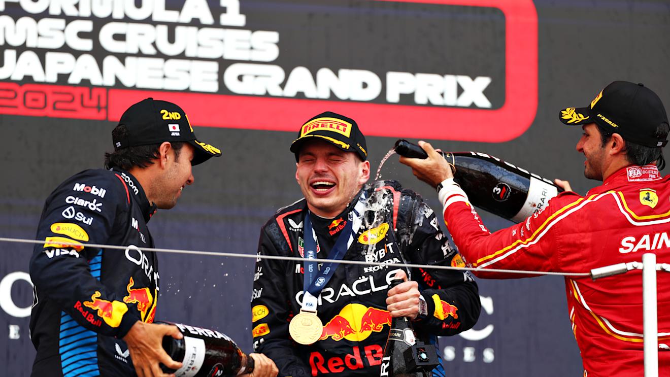 SUZUKA, JAPAN - APRIL 07: Race winner Max Verstappen of the Netherlands and Oracle Red Bull Racing, Second placed Sergio Perez of Mexico and Oracle Red Bull Racing and Third placed Carlos Sainz of Spain and Ferrari celebrate on the podium during the F1 Grand Prix of Japan at Suzuka International Racing Course on April 07, 2024 in Suzuka, Japan. (Photo by Peter Fox/Getty Images)