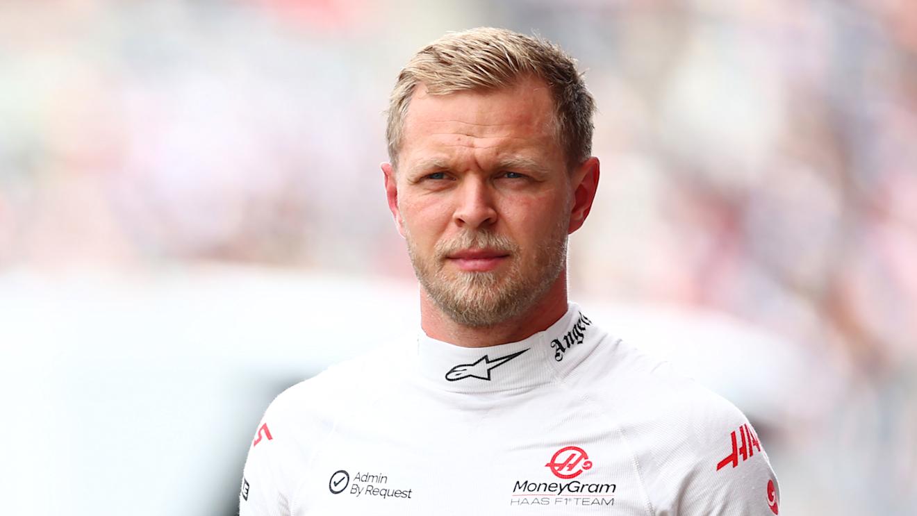 SUZUKA, JAPAN - APRIL 06: 18th placed qualifier Kevin Magnussen of Denmark and Haas F1 walks in the Pitlane during qualifying ahead of the F1 Grand Prix of Japan at Suzuka International Racing Course on April 06, 2024 in Suzuka, Japan. (Photo by Bryn Lennon - Formula 1/Formula 1 via Getty Images)
