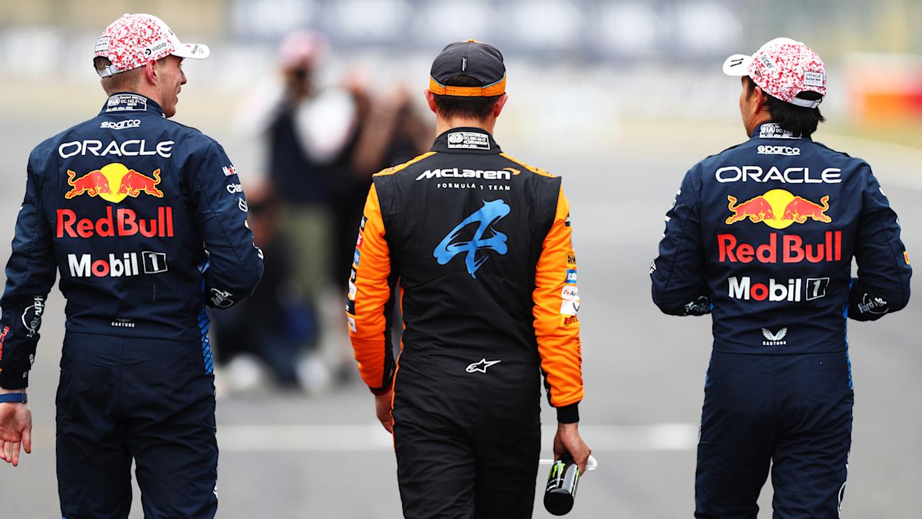 SUZUKA, JAPAN - APRIL 06: Race winner qualifier Max Verstappen of the Netherlands and Oracle Red Bull Racing (L), Second placed qualifier Sergio Perez of Mexico and Oracle Red Bull Racing (R) and Third placed qualifier Lando Norris of Great Britain and McLaren (C) walk in parc ferme during qualifying ahead of the F1 Grand Prix of Japan at Suzuka International Racing Course on April 06, 2024 in Suzuka, Japan. (Photo by Peter Fox/Getty Images)