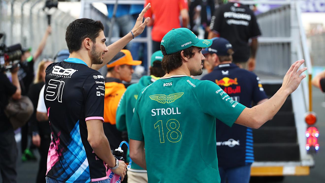 JEDDAH, SAUDI ARABIA - MARCH 09: Lance Stroll of Canada and Aston Martin F1 Team and Esteban Ocon of France and Alpine F1 wave to the crowd on the drivers parade prior to the F1 Grand Prix of Saudi Arabia at Jeddah Corniche Circuit on March 09, 2024 in Jeddah, Saudi Arabia. (Photo by Peter Fox - Formula 1/Formula 1 via Getty Images)