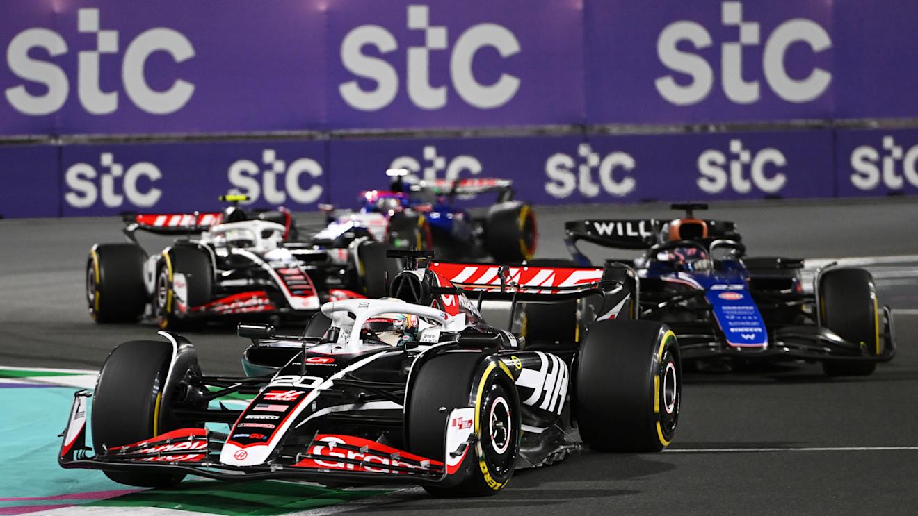 JEDDAH, SAUDI ARABIA - MARCH 09: Kevin Magnussen of Denmark driving the (20) Haas F1 VF-24 Ferrari leads Alexander Albon of Thailand driving the (23) Williams FW46 Mercedes during the F1 Grand Prix of Saudi Arabia at Jeddah Corniche Circuit on March 09, 2024 in Jeddah, Saudi Arabia. (Photo by Rudy Carezzevoli/Getty Images)