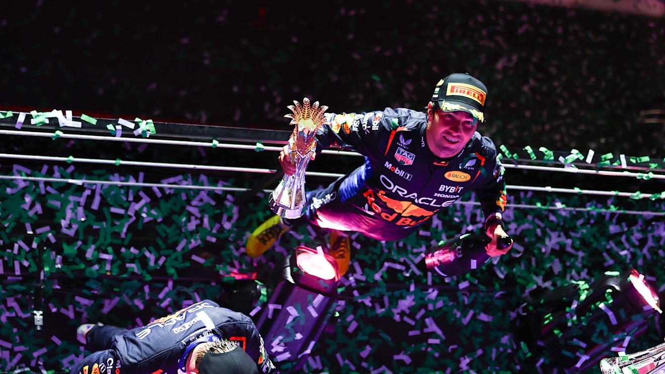 JEDDAH, SAUDI ARABIA - MARCH 09: Second placed Sergio Perez of Mexico and Oracle Red Bull Racing celebrates on the podium during the F1 Grand Prix of Saudi Arabia at Jeddah Corniche Circuit on March 09, 2024 in Jeddah, Saudi Arabia. (Photo by Mark Thompson/Getty Images)