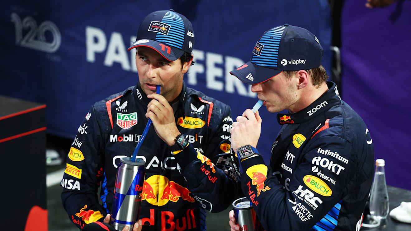 JEDDAH, SAUDI ARABIA - MARCH 09: Second placed Sergio Perez of Mexico and Oracle Red Bull Racing and Race winner Max Verstappen of the Netherlands and Oracle Red Bull Racing react in parc ferme during the F1 Grand Prix of Saudi Arabia at Jeddah Corniche Circuit on March 09, 2024 in Jeddah, Saudi Arabia. (Photo by Clive Rose/Getty Images)