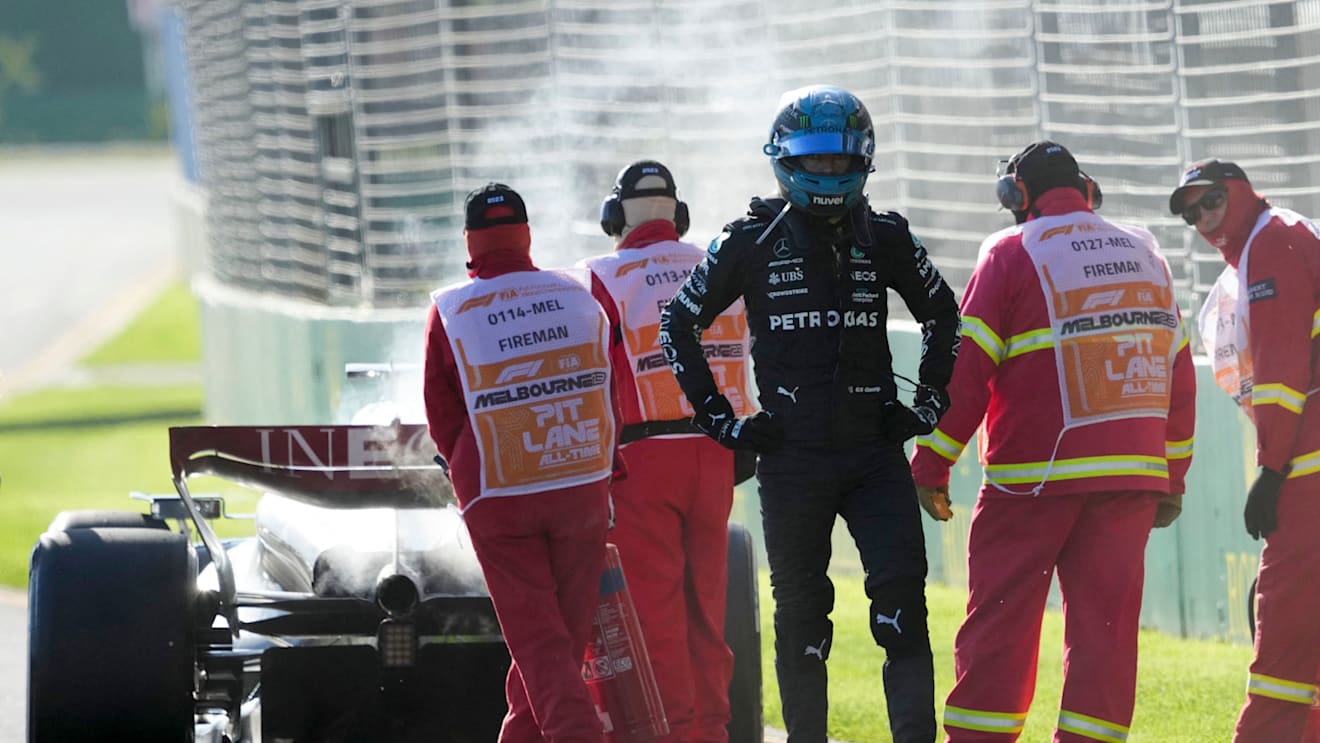 Mercedes' British driver George Russell walks back to the pits after his car caught fire during the 2023 Formula One Australian Grand Prix at the Albert Park Circuit in Melbourne on April 2, 2023. (Photo by Simon Baker / POOL / AFP) / -- IMAGE RESTRICTED TO EDITORIAL USE - STRICTLY NO COMMERCIAL USE -- (Photo by SIMON BAKER/POOL/AFP via Getty Images)