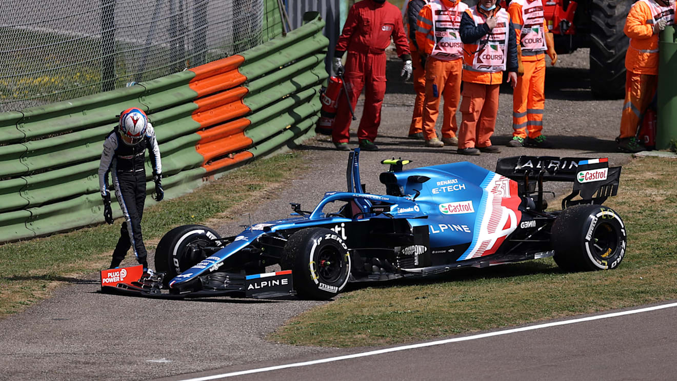 IMOLA, ITALY - APRIL 16: Esteban Ocon of France and Alpine F1 Team inspects his car after stopping on track during practice ahead of the F1 Grand Prix of Emilia Romagna at Autodromo Enzo e Dino Ferrari on April 16, 2021 in Imola, Italy. (Photo by Lars Baron/Getty Images)
