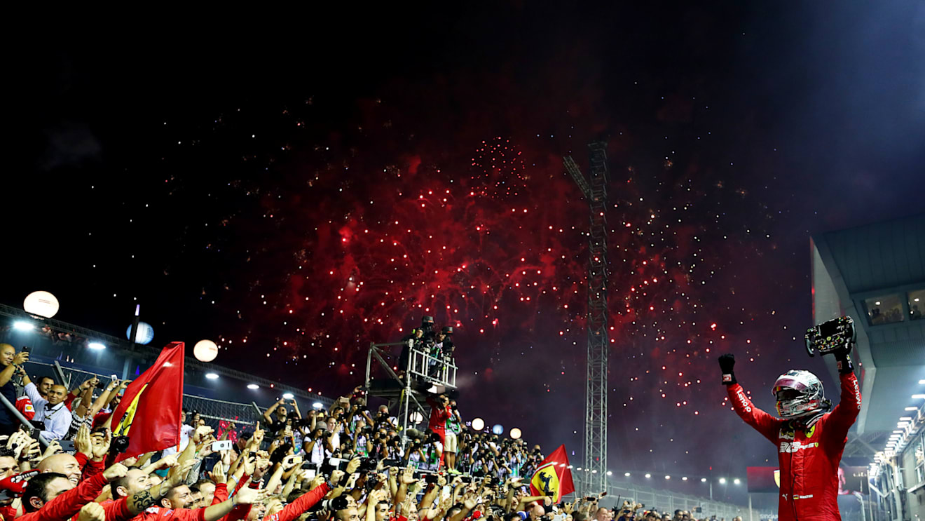 SINGAPORE, SINGAPORE - SEPTEMBER 22: Race winner Sebastian Vettel of Germany and Ferrari celebrates in parc ferme during the F1 Grand Prix of Singapore at Marina Bay Street Circuit on September 22, 2019 in Singapore. (Photo by Lars Baron/Getty Images)