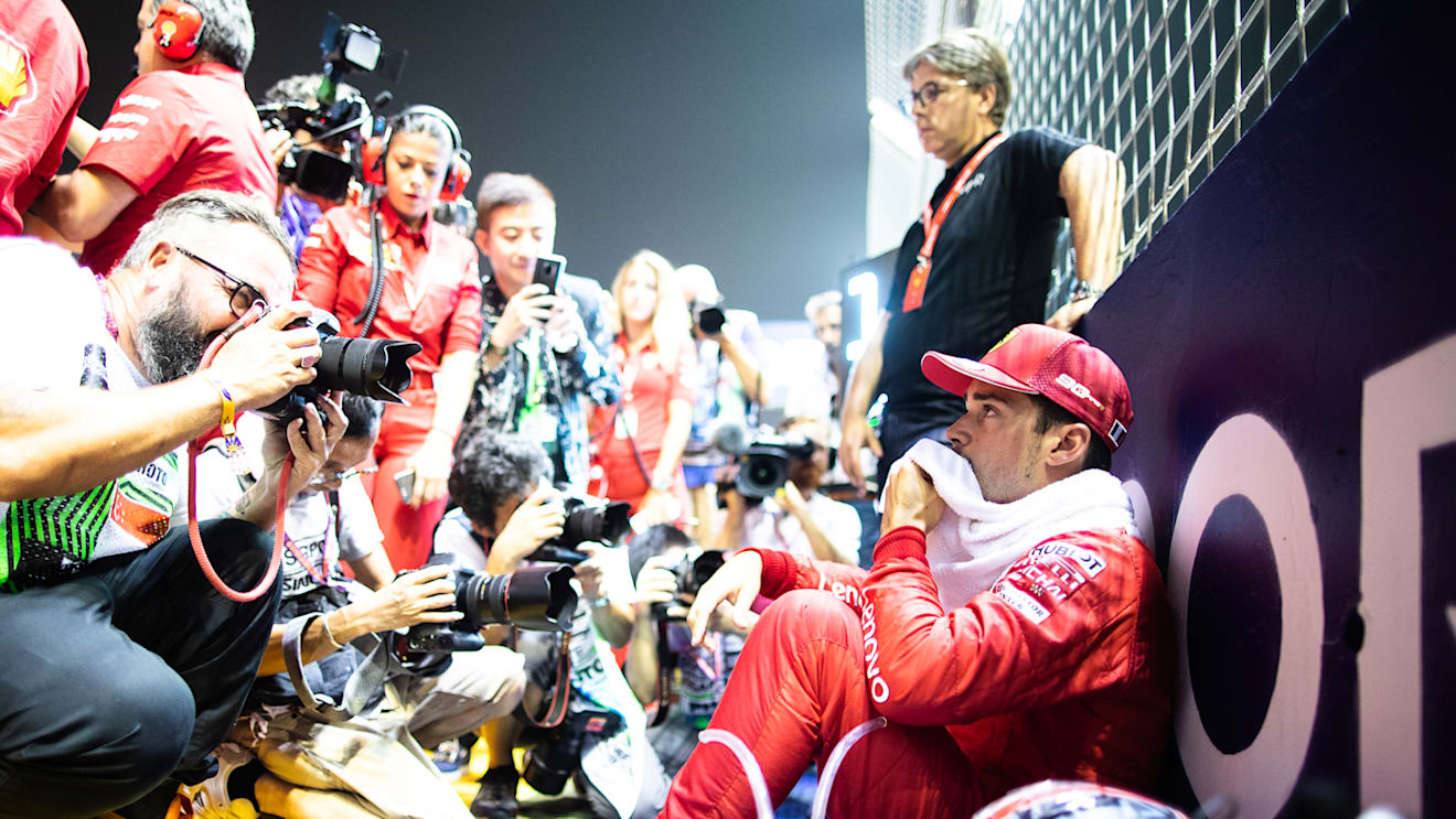 SINGAPORE, SINGAPORE - SEPTEMBER 22: Charles Leclerc of Monaco and Ferrari prepares to drive on the grid before the F1 Grand Prix of Singapore at Marina Bay Street Circuit on September 22, 2019 in Singapore. (Photo by Lars Baron/Getty Images)