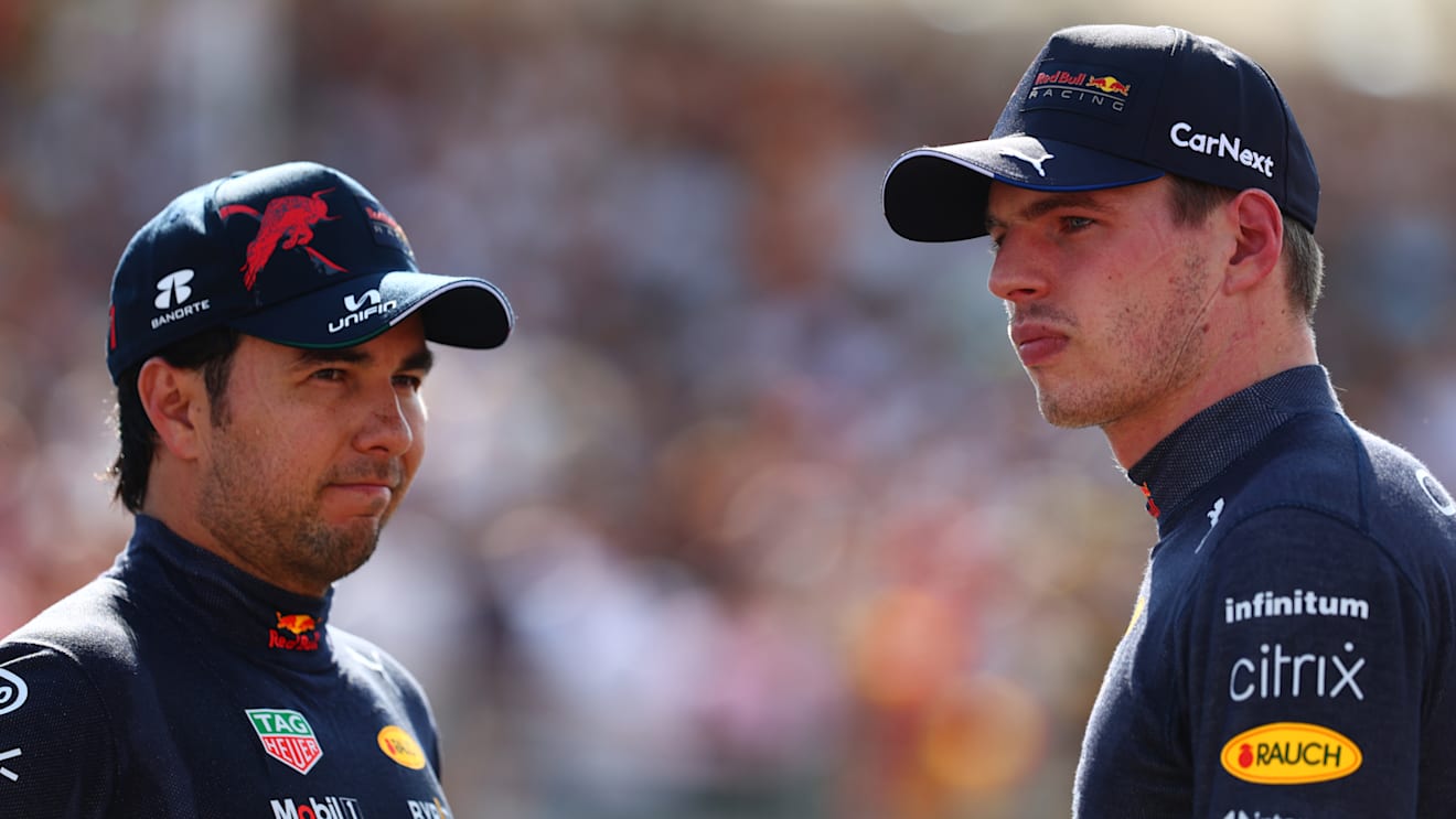 LE CASTELLET, FRANCE - JULY 23: Second placed qualifier Max Verstappen of the Netherlands and Oracle Red Bull Racing and Third placed qualifier Sergio Perez of Mexico and Oracle Red Bull Racing talk in parc ferme during qualifying ahead of the F1 Grand Prix of France at Circuit Paul Ricard on July 23, 2022 in Le Castellet, France. (Photo by Mark Thompson/Getty Images)