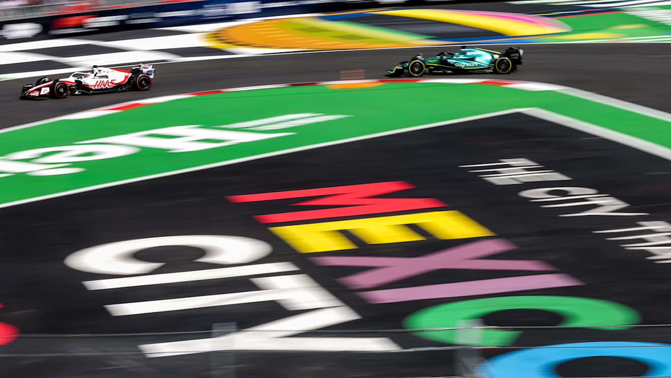 MEXICO CITY, MEXICO - OCTOBER 29: Kevin Magnussen of Denmark and Haas and Lance Stroll of Aston Martin and Canada  during qualifying ahead of the F1 Grand Prix of Mexico at Autodromo Hermanos Rodriguez on October 29, 2022 in Mexico City, Mexico. (Photo by Peter J Fox/Getty Images )