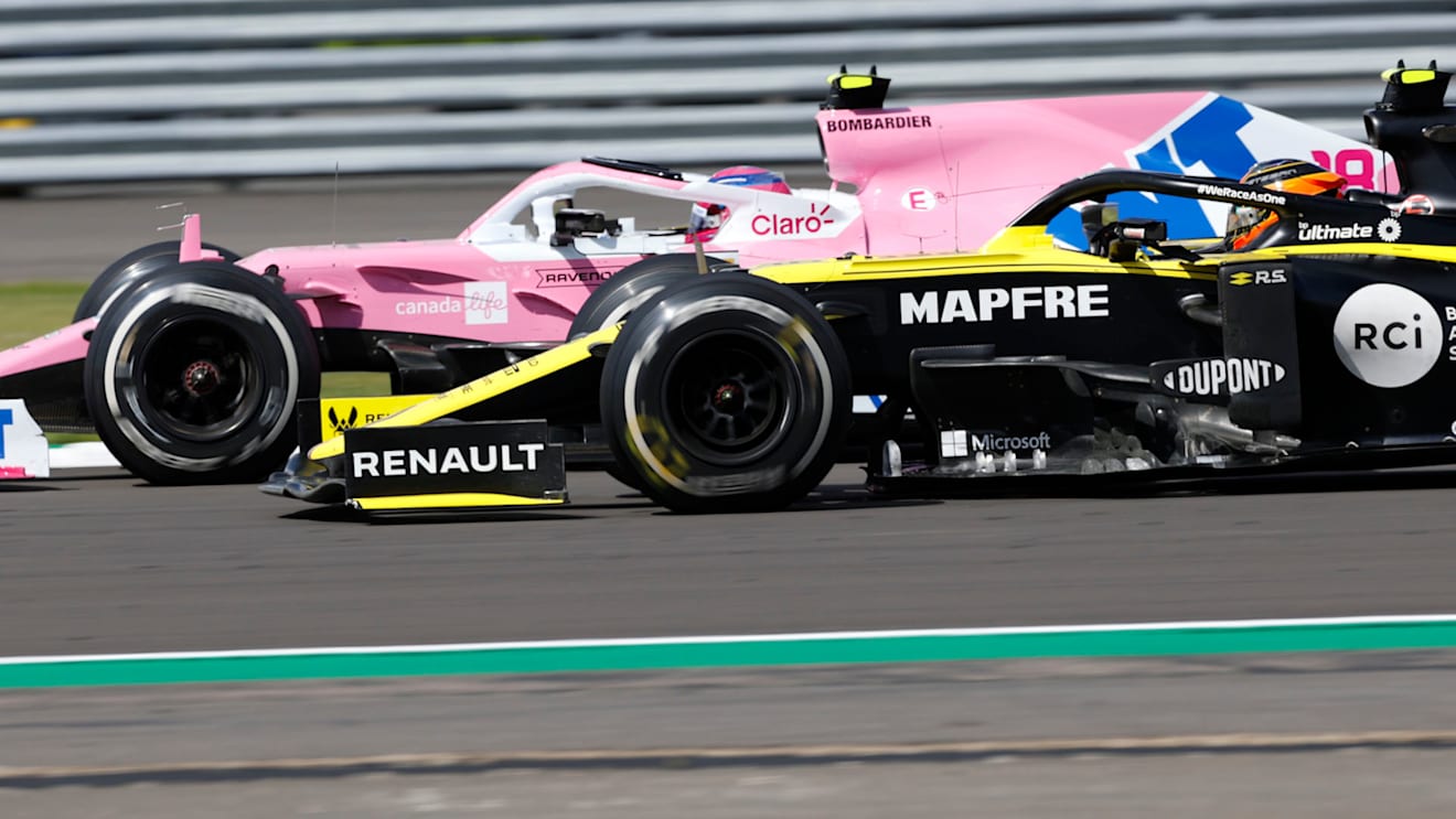 Formula One F1 - British Grand Prix - Silverstone Circuit, Silverstone, Britain - August 2, 2020 Racing Point's Lance Stroll and Renault's Esteban Ocon in action during the race Pool via REUTERS/Andrew Boyers