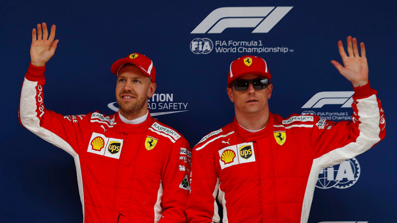 SHANGHAI INTERNATIONAL CIRCUIT, CHINA - APRIL 14: Pole position man Sebastian Vettel, Ferrari, celebrates between Valtteri Bottas, Mercedes AMG F1, and Kimi Raikkonen, Ferrari during the Chinese GP at Shanghai International Circuit on April 14, 2018 in Shanghai International Circuit, China. (Photo by Glenn Dunbar / LAT Images) © Motorsport Images Tel: +44(0)20 8267 3000 email: info@motorsportimages.com