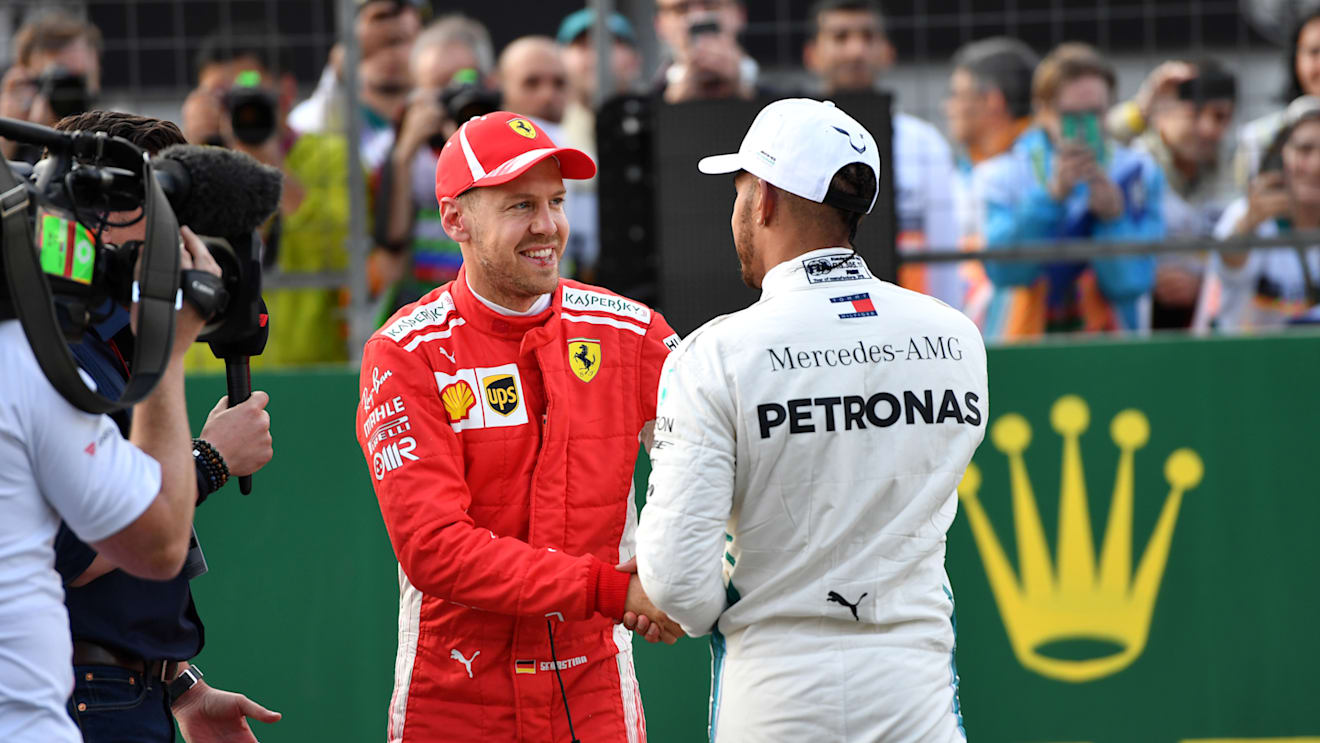 Pole sitter Sebastian Vettel (GER) Ferrari and Lewis Hamilton (GBR) Mercedes-AMG F1 celebrate in parc ferme at Formula One World Championship, Rd4, Azerbaijan Grand Prix, Qualifying, Baku City Circuit, Baku, Azerbaijan, Saturday 28 April 2018. © Sutton Im