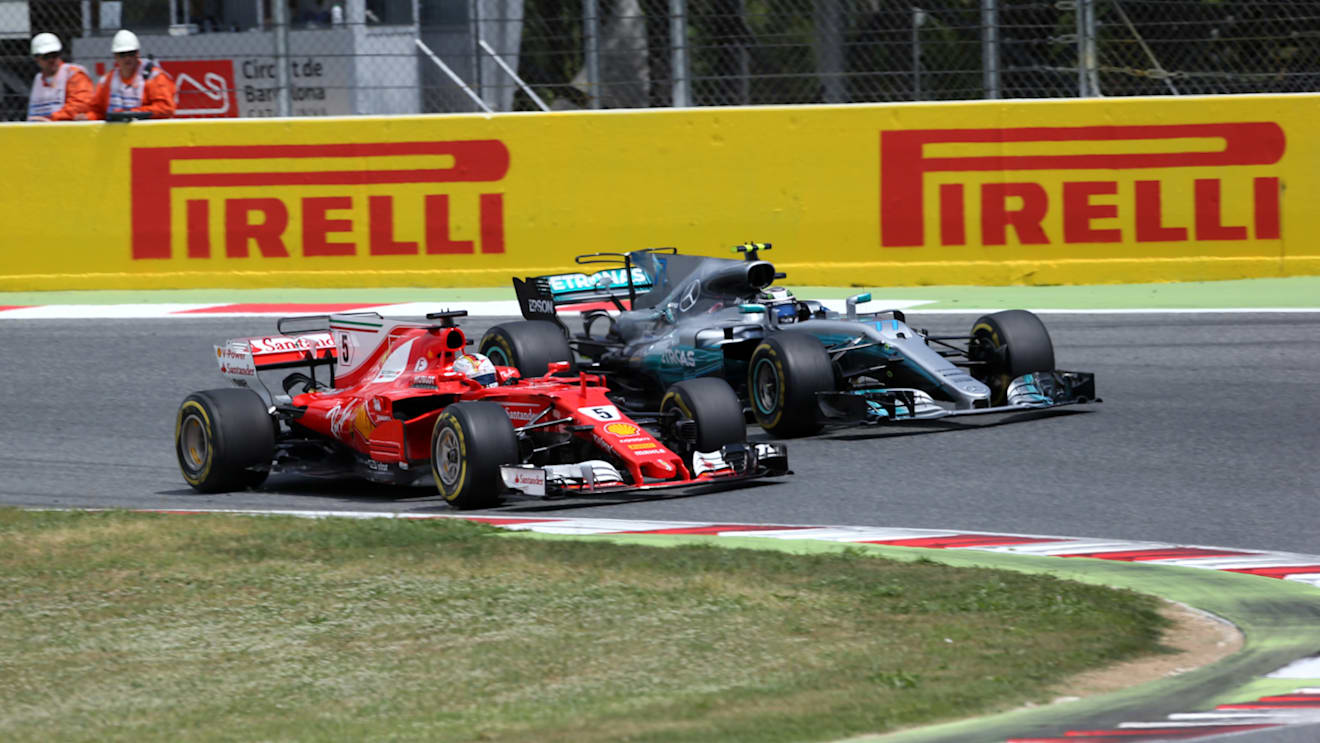 Sebastian Vettel (GER) Ferrari SF70-H and Valtteri Bottas (FIN) Mercedes-Benz F1 W08 Hybrid battle for position at Formula One World Championship, Rd5, Spanish Grand Prix, Race, Barcelona, Spain, Sunday 14 May 2017. © Sutton Motorsport Images