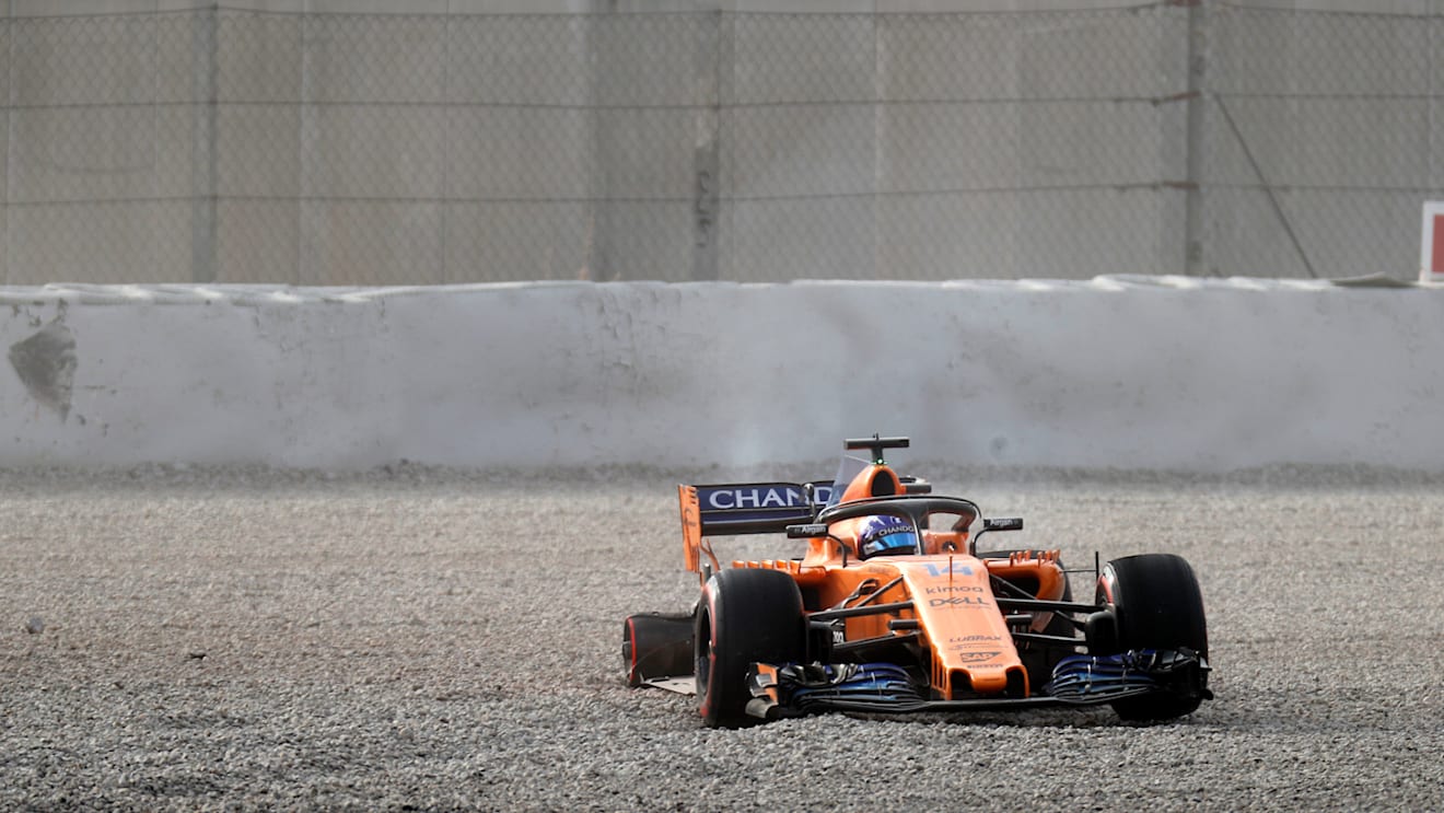 Fernando Alonso (ESP) McLaren MCL33 in the gravel with missing rear wheel at Formula One Testing, Day One, Barcelona, Spain, 26 February 2018. © Sutton Images