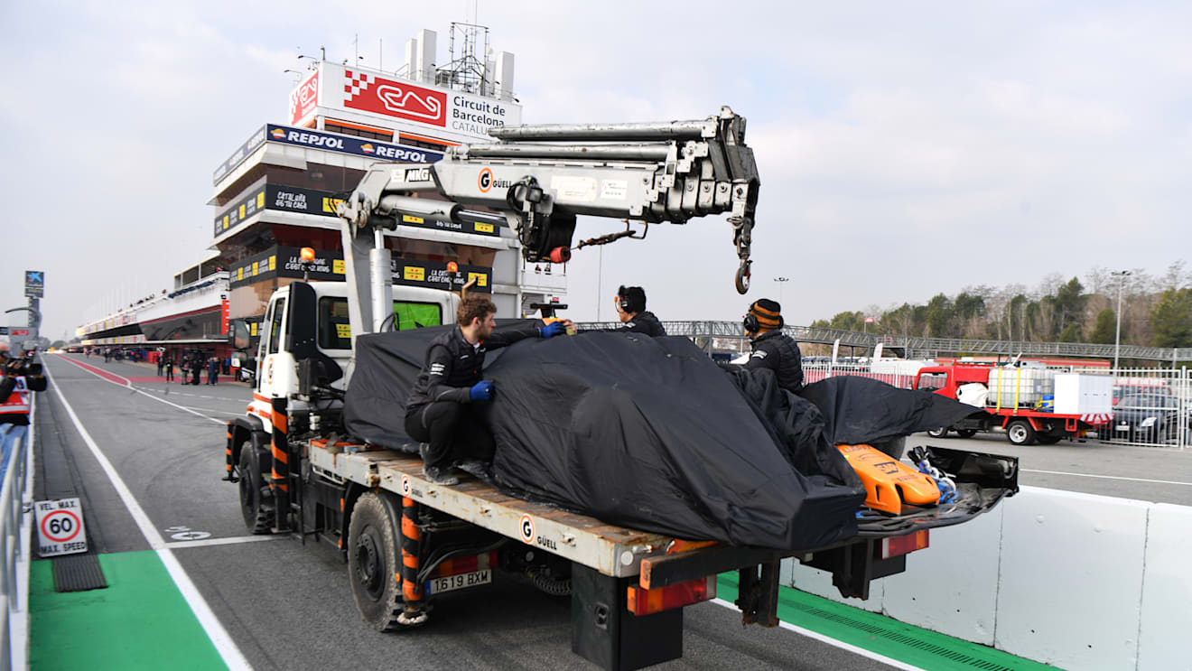 The car of Fernando Alonso (ESP) McLaren MCL33 is recovered to the pits at Formula One Testing, Day One, Barcelona, Spain, 26 February 2018.