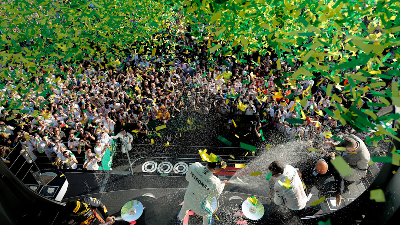 MELBOURNE GRAND PRIX CIRCUIT, AUSTRALIA - MARCH 17: Valtteri Bottas, Mercedes AMG F1, 1st position, celebrates with Champagne on the podium during the Australian GP at Melbourne Grand Prix Circuit on March 17, 2019 in Melbourne Grand Prix Circuit, Australia. (Photo by Steven Tee / LAT Images)