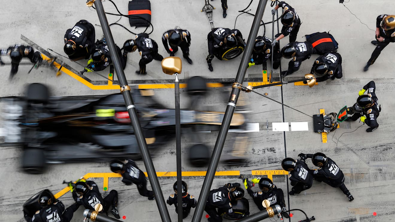 SHANGHAI INTERNATIONAL CIRCUIT, CHINA - APRIL 14: Kevin Magnussen, Haas VF-19, makes a pit stop during the Chinese GP at Shanghai International Circuit on April 14, 2019 in Shanghai International Circuit, China. (Photo by Steven Tee / LAT Images)