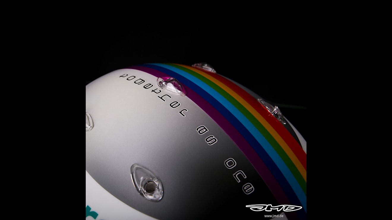 The 'together as one' message on top of Vettel's helmet